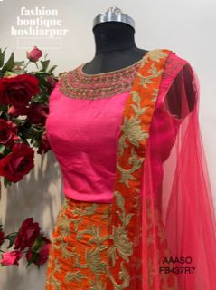 ORANGE KHADI SILK ELHNGA WITH HOT PINK BLOUSE AND NET DUPATTA