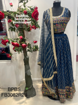 BLUE LEHNGA CHOLI WITH MULTICOLORED SEQUIN EMBROIDERY ON BLOUSE WITH NET DUPATTA