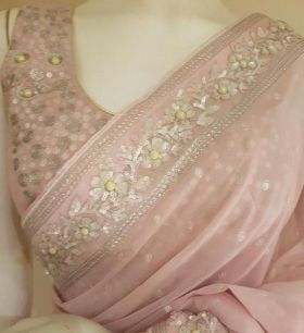 Baby pink georgette saree with sequenced and pearl work 