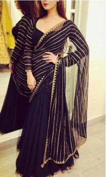 Black georgette saree with golden lining designing