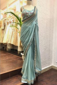 Sky blue georgette saree with beautiful embroidered blouse