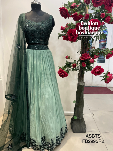 PISTA GREEN LEHNGA WITH BOTTLE GREEN BLOUSE WITH NET DUPATTA