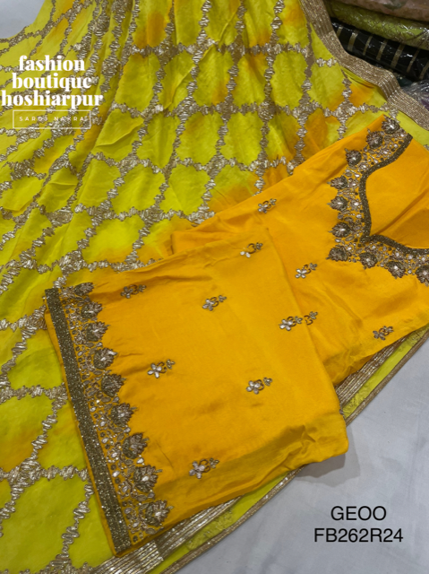 BRIGHT YELLOW PARTY WEAR UN STITCHED SUIT WITH CUT DANA WORK ON SUIT AND GOTTA ON DUPATTA