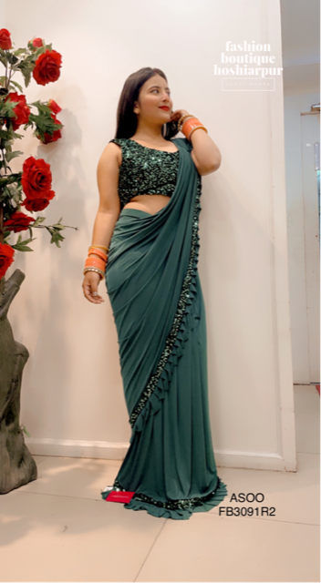 BOTTLE GREEN LYCRA SAREE WITH SEQUIN BLOUSE