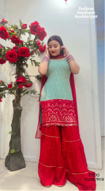 A BEAUTIFUL PASTEL COLOURED SUIT WITH MAROON SHARARA AND DUPATTA