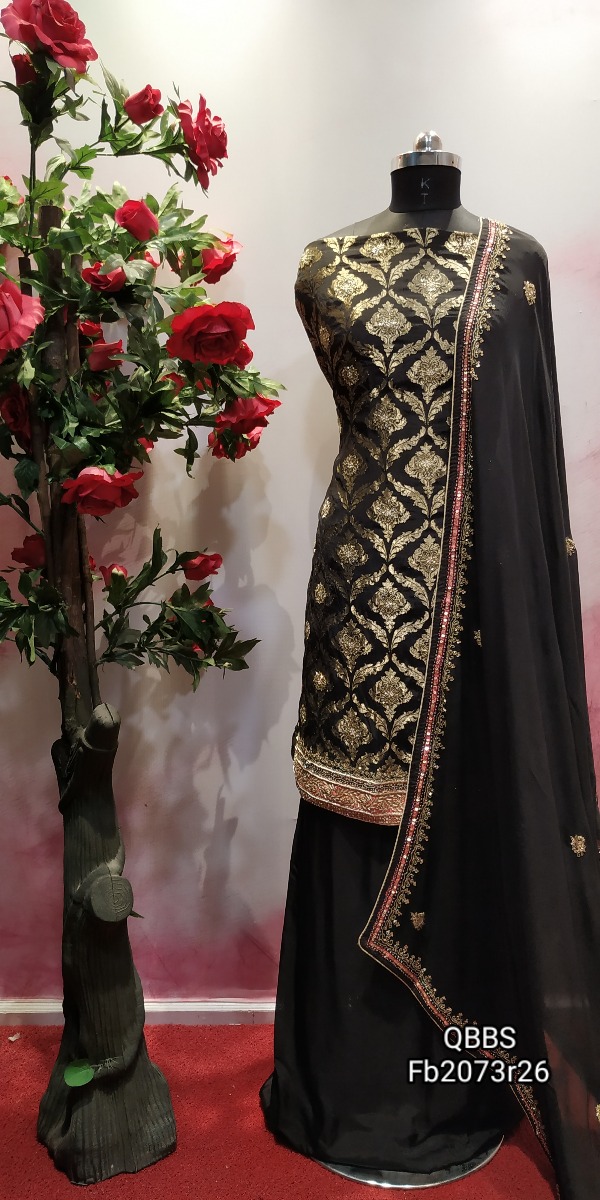 Very elegant pure brocket silk suit in black colour