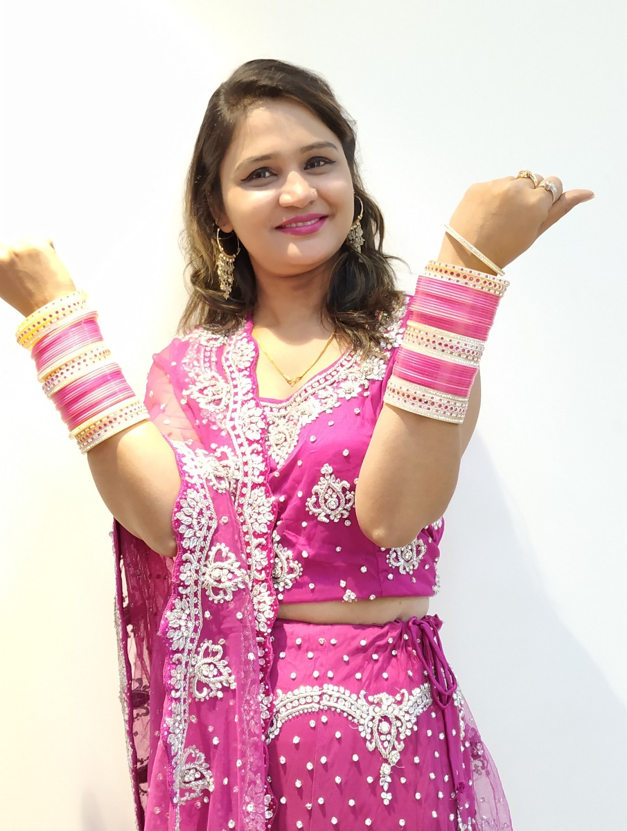 Dabka Worked on Hot pink Net lehenga