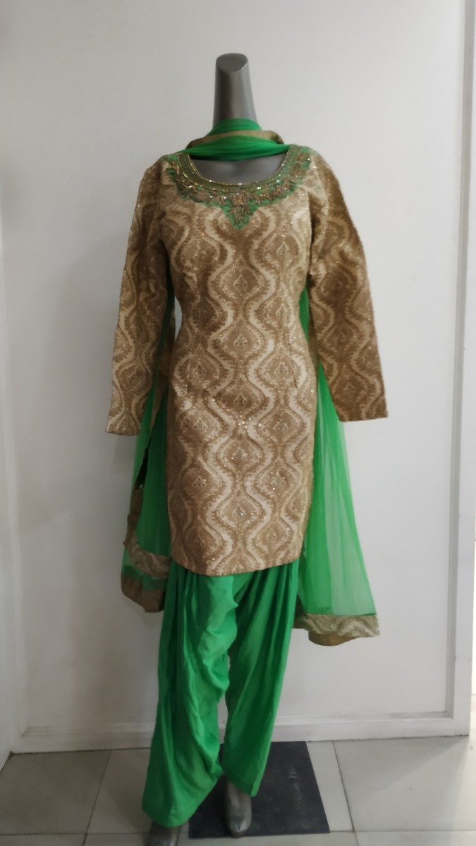 Pure khadi silk salwar kameez with heavy neck embroidery