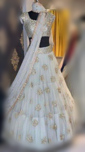 Pure white frilled with silver sequenced lehenga choli