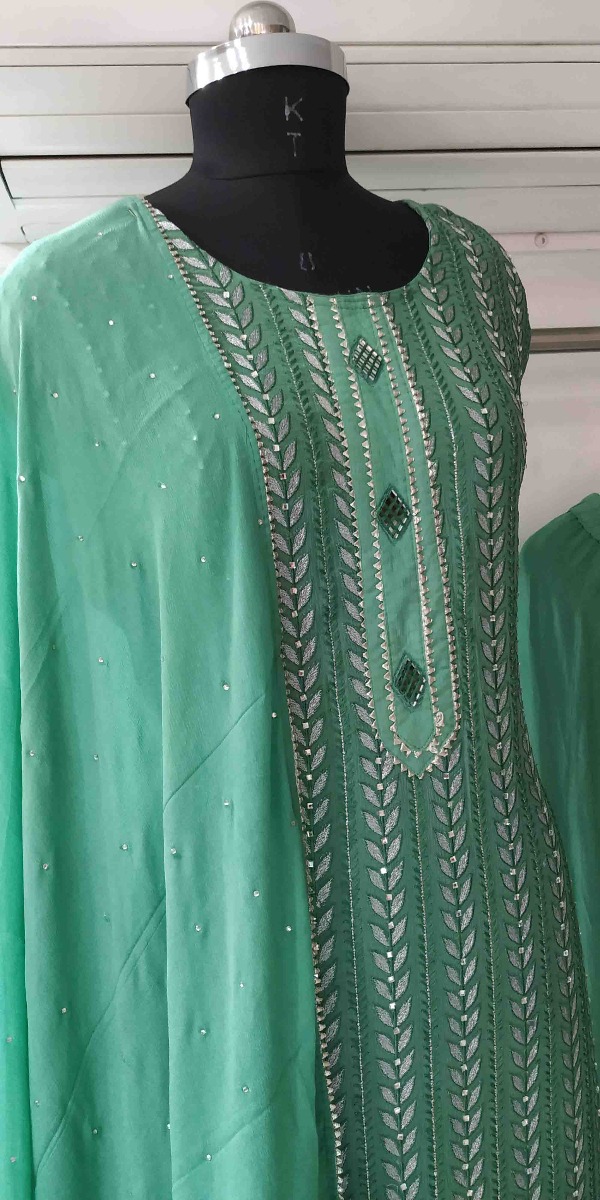 A VERY DECENT LOOKED SEMI-STITCHED SHARARA SUIT