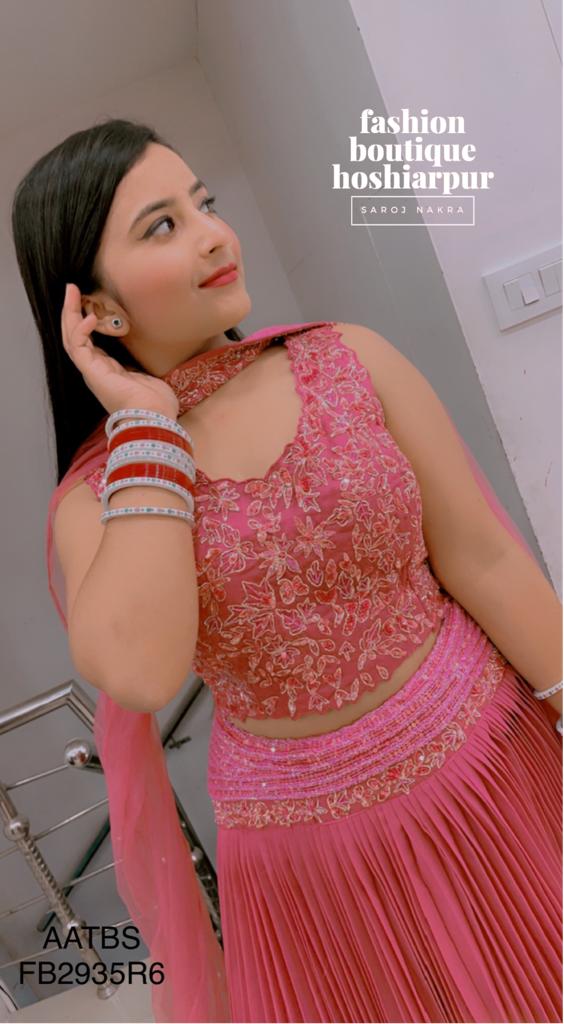 HOT PINK GEORGETTE FLAIRY LEHNGA WITH SEQUIN WORKED AND DESIGNER NECK NET DUPATTA