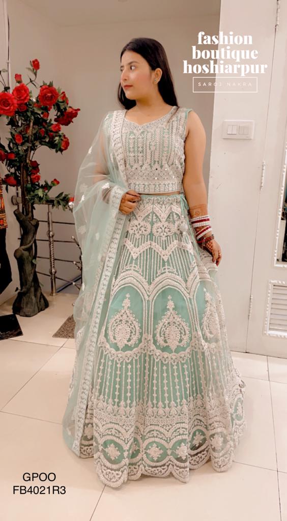 PISTA GREEN NET LEHNGA CHOLI WITH NET DUPATTA WITH NEEMZARI HEAVY WORK