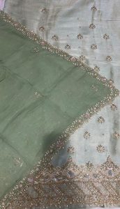 Shimmer Fabric pista colour with lovely hand work party work suit